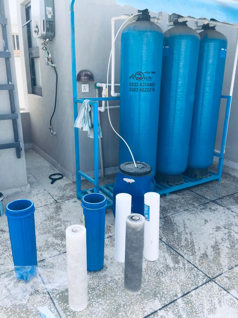 Changing filters water filtration process in Islamabad